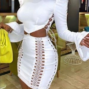 White lace up with bell sleeves top and skirt set (joined as a dress) worn once.